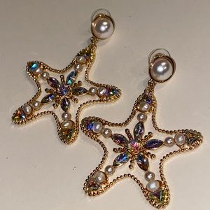 Star studded earrings.